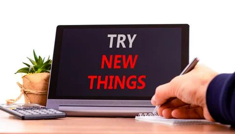 Try new things symbol. Concept words Try new things on beautiful black tabl.. Stock Photos