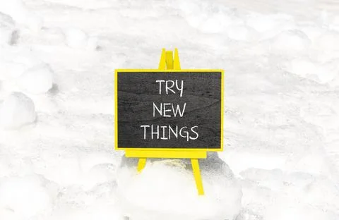 Try new things symbol. Concept words Try new things on beautiful blackboard.. Foto stock