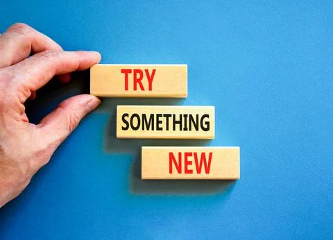 Try something new symbol. Concept words Try something new on beautiful bloc.. Stock Photos