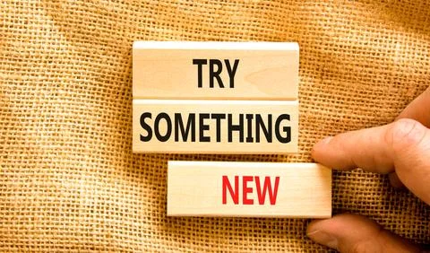 Try something new symbol. Concept words Try something new on beautiful bloc.. Stock Photos