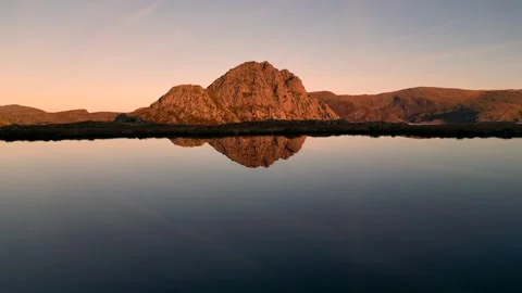 Tryfan Snowdonia, with lake reflection, drone view Stock Footage 319670682
