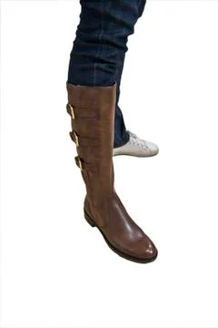 Trying boots Stock Photos