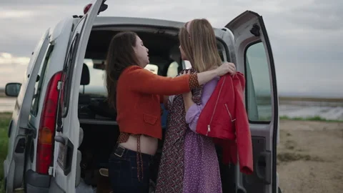 Trying on the clothes for the model for the shoot Stock Footage 280213324