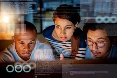 Trying to fix software issues together. Shot of computer programmers looking  Stock-Fotos