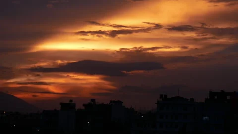 Trying to fly a kite in an evening time, sun emitting orange color on horizon Stock Footage 258657149