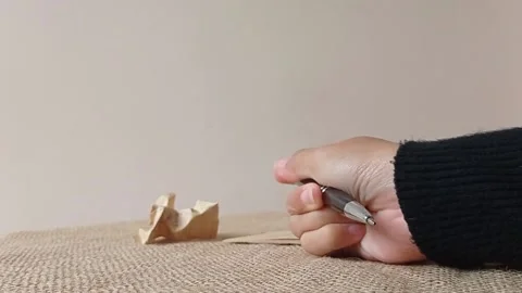 Trying to make a note after thinking hard about what to write Stock Footage 151027430