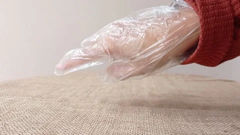 Trying the new plastic gloves for making a bread Stock Footage 149957808