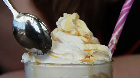 Trying Out The Ice Cream With A Spoon Stock Footage 49792748