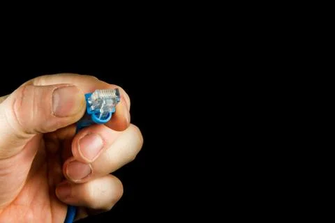 Trying to plug it in Stock Photos