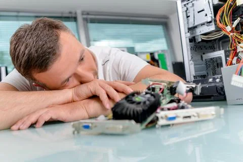 Trying to repair a computer Stock Photos