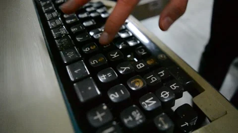 Trying to tap the buttons of the printing machine Stock Footage 67182590