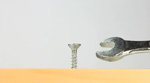 Trying to tighten the screws the wrong tool. Stock Footage 43037038