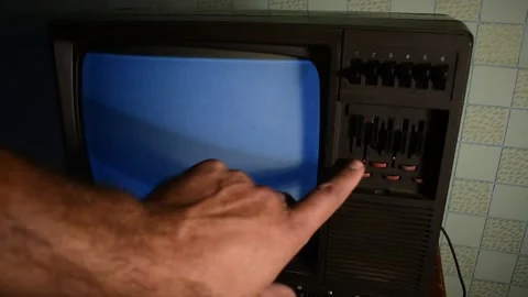 Trying to tune an old TV Stock Footage 138159288