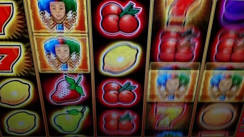 Trying to win jackpot with slot machine. spinning slot machine jackpot. Video stock 217430746