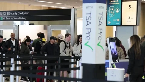 TSA PreCheck and Global Entry programs at US airports will remain operational, S Stock Footage 329530108