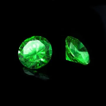 Tsavorite Garnet on a black background Stock Photos