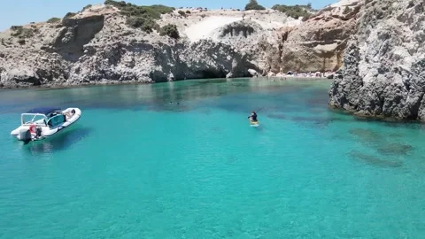 Tsigrado Beach, crystal-clear waters, rocky cliffs Stock Footage 300038365