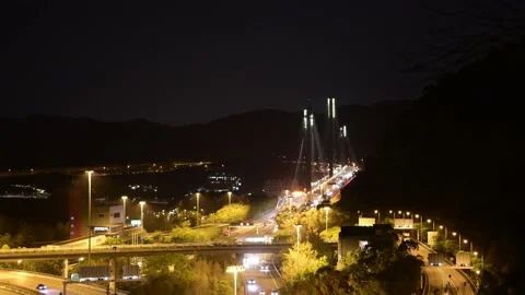 Tsing Ma Bridge from Tsing Yi at the night Part B Stock Footage 154268906