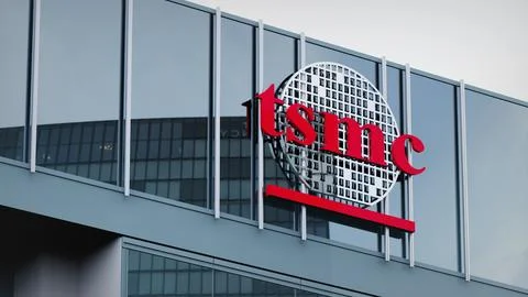 TSMC Stock data presented on the logo of the office facade editorial Stock Photos