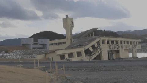 Tsunami Collapsed building close to Tsunami Memorial Rikuzentakata, Japan Stock Footage 157213680