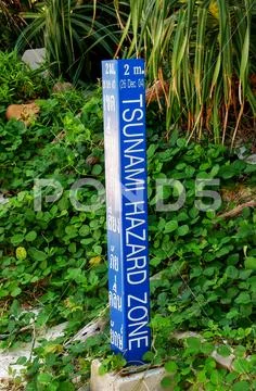 Tsunami hazard zone sign on Phi Phi Leh Island, Krabi province, Thailand Stock Photos
