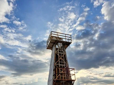 Tsunami Warning Tower with cloudy sky background Stock-Fotos