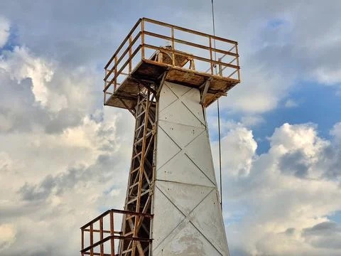 Tsunami Warning Tower with cloudy sky background Foto stock