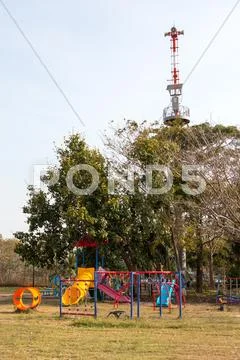 Tsunami warning tower at a playground Stock Photos