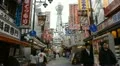 Tsutenkaku Tower Shinsekai District Shopping Street Osaka People Walk Visit Shop HD Footage