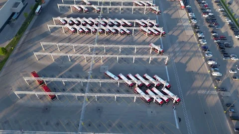 TTC public transit electric buses charging at transportation depot in urban city Stock Footage 305653773