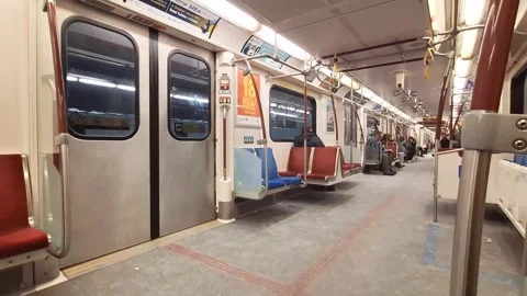 TTC subway train interior with passengers arriving at station Stock Footage 326168441