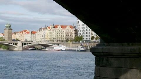Tthe ship arrives at the bridge in Prague center Stock Footage 253429510