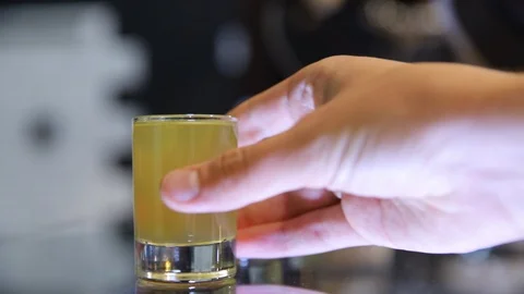 TThree women's hands take one glass after another. Close up shot Stock-Footage 104058452