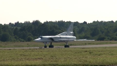 Tu-22M3 long-range supersonic bomber from taxis to landing strip . Stock Footage 110870076