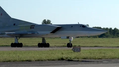 Tu-22M3 long-range supersonic bomber taxis in direction of parking. Stock Footage 111379986