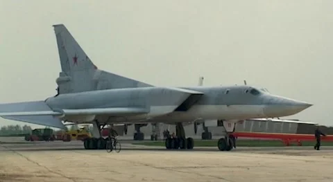 Tu-22M3 (NATO-Backfire-C) supersonic bomber  towing after landing. Close-up. Stock Footage 175828377