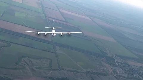 The Tu-95 in u-turn over the river Stock Footage 69802163