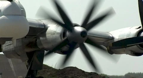 Tu-95MS (NATO: - Bear). Starting first left engine at starting position Stock Footage 172535983