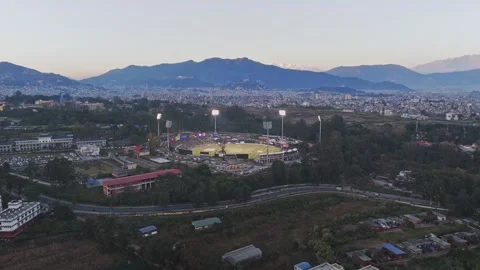 TU Cricket Ground Under Floodlights – Night Aerial View During Nepal Premier Video stock 323285235