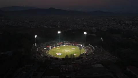 TU Cricket Ground Under Floodlights – Night Aerial View During Nepal Premier Video stock 323285269
