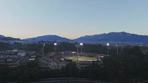 TU Cricket Ground Under Floodlights – Night Aerial View During Nepal Premier Video stock 323344069