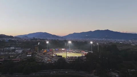 TU Cricket Ground Under Floodlights – Night Aerial View During Nepal Premier Video stock 323344076