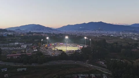 TU Cricket Ground Under Floodlights – Night Aerial View During Nepal Premier Video stock 323347975