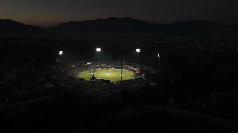 TU Cricket Ground Under Floodlights – Night Aerial View During Nepal Premier Video stock 323384492