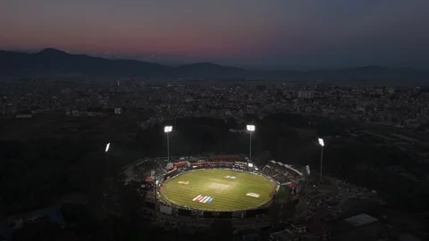 TU Cricket Ground Under Floodlights – Night Aerial View During Nepal Premier Video stock 323420280