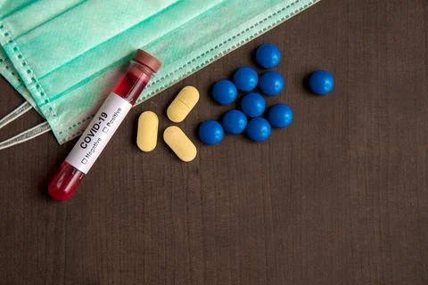 Tube containing a blood sample for testing to the presence of coronavirus /.. Stock Photos