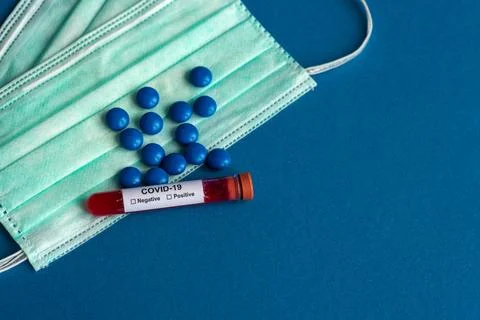 Tube containing a blood sample for testing to the presence of coronavirus /.. Stock Photos