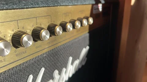 Tube guitar amplifier with knobs and electric guitar 動画素材 278592740
