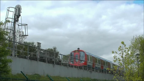 Tube train approaches camera, above ground Video stock 107653545