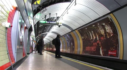 Tube train passing though the station Stock Footage 45406799